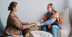 A woman talking to her mum about getting a JBSP mortgage