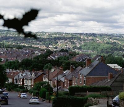 View of lots of houses from the top of a hill