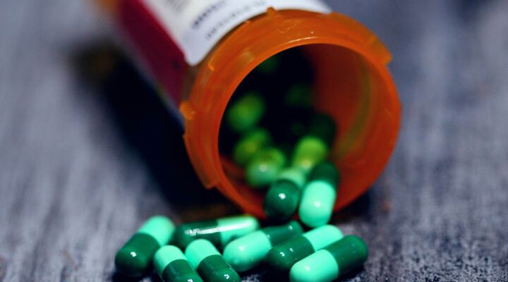 Prescription bottle with capsules