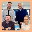 Staff from The Levels Financial holding a sponsored programme at a Torquay United game