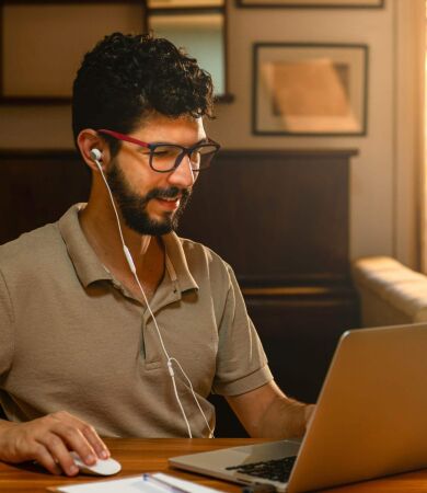 A man on a video call on his laptop