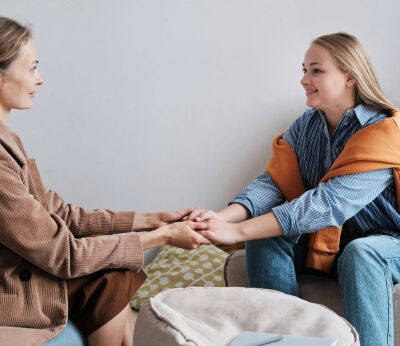 A woman talking to her mum about getting a JBSP mortgage