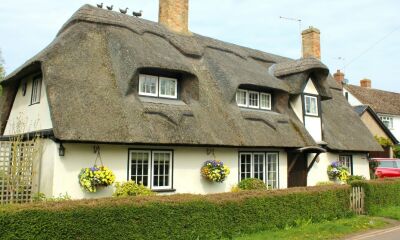 Thatched roof house which is a non-standard construction